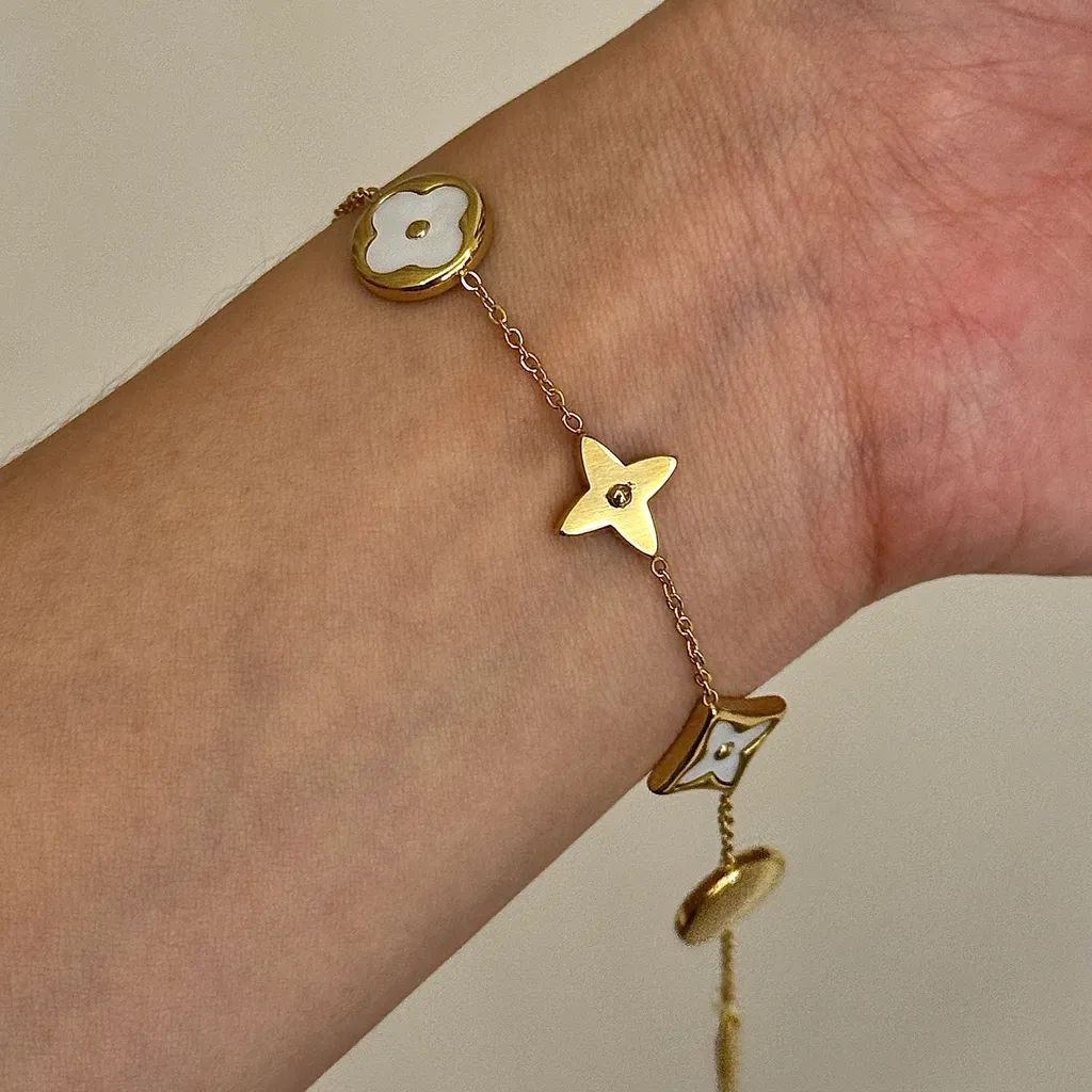 Gold-Tone and Black/White Enamel Charm Link Bracelet