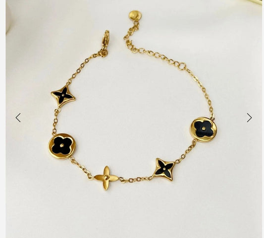 Gold-Tone and Black/White Enamel Charm Link Bracelet