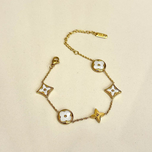 Gold-Tone and Black/White Enamel Charm Link Bracelet